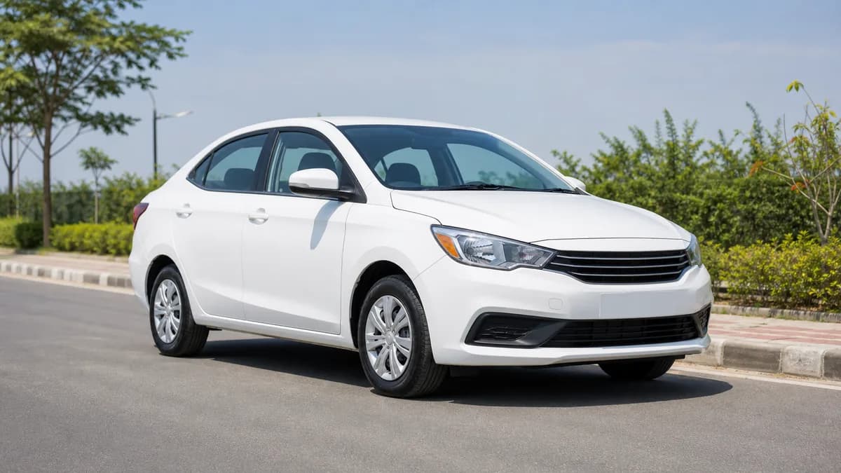 White 4-seater sedan for KKR Travels car rental enquiries
